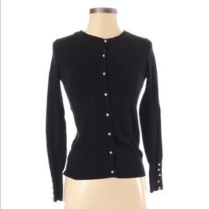 Zara black sweater with pearl button detail.